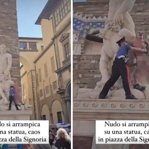 Firenze, uomo nudo con scritta “censurato” si arrampica su statua in piazza della Signoria<br />&copy; Marco Landi