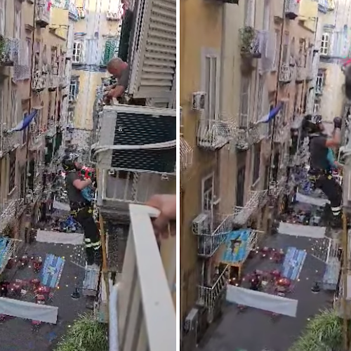 Napoli, vigile del fuoco si arrampica su un palazzo per salvare... un piccione